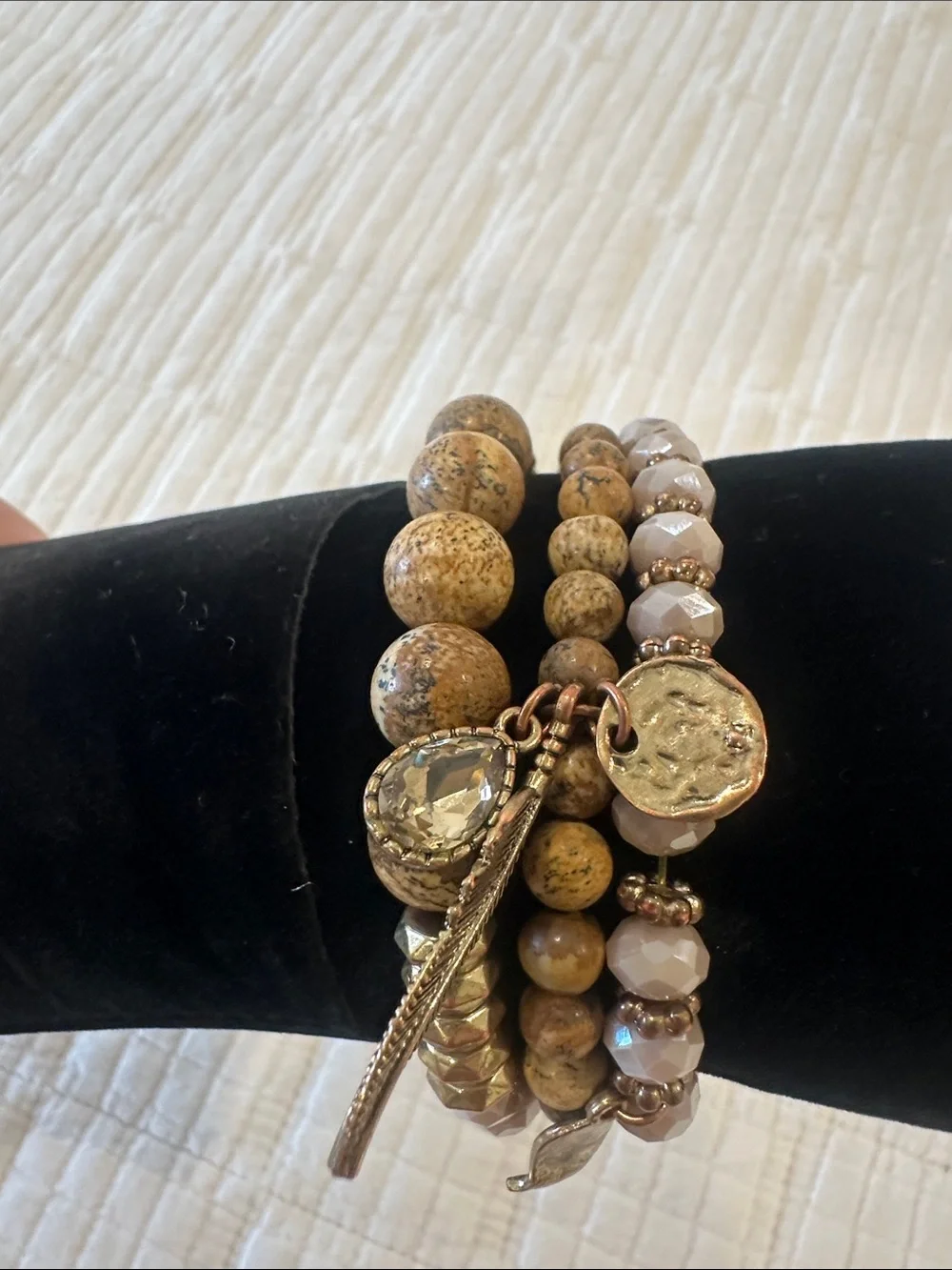 Neutral Stone and Faceted Bead Stack Bracelet with Gold Feather Charm